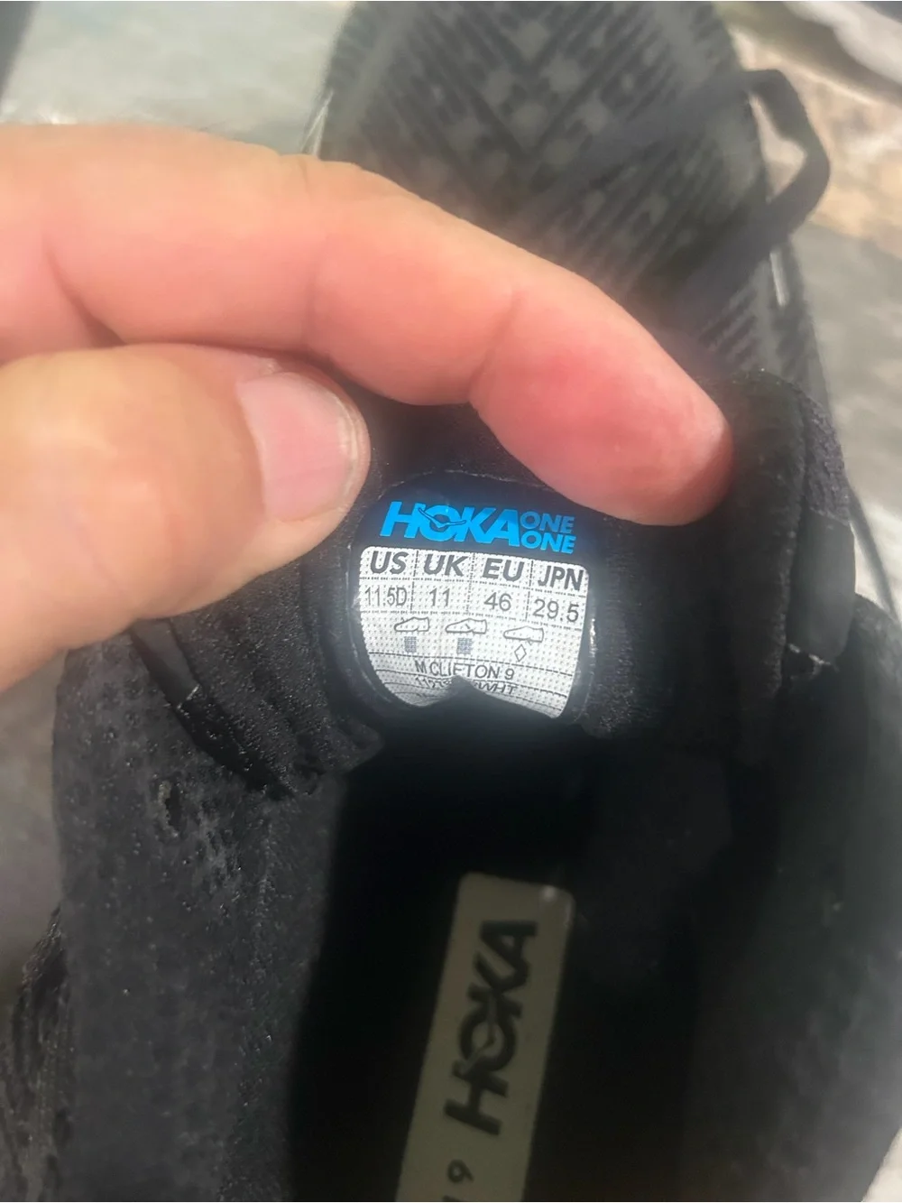 Men's size 11.5D Hoka Black and White Road Running Shoes